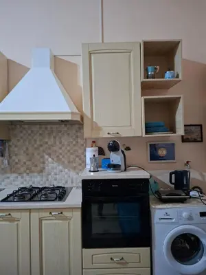 Cucina o angolo cottura di Casa Vacanze Donna Manu- Centralissima Tra Stazione Centrale ed Aeroporto