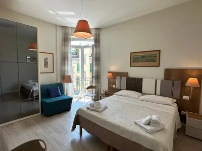 Letto o letti in una camera di Domus Luca - Central Rooms in the Heart of Naples