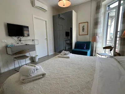 Letto o letti in una camera di Domus Luca - Central Rooms in the Heart of Naples
