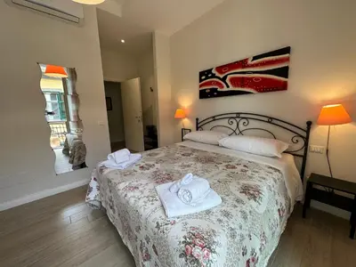 Letto o letti in una camera di Domus Luca - Central Rooms in the Heart of Naples