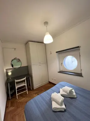 Letto o letti in una camera di Palazzo Rota GuestHouse