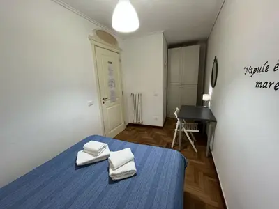 Letto o letti in una camera di Palazzo Rota GuestHouse