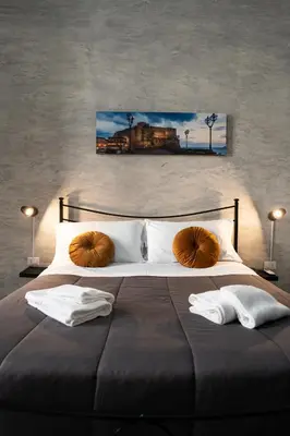 Letto o letti in una camera di San Felice Palace
