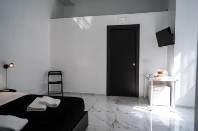 Letto o letti in una camera di San Felice Palace
