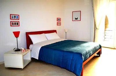 Letto o letti in una camera di Casa Torrenapoli