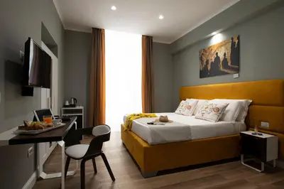 Letto o letti in una camera di Dante Maison de Prestige
