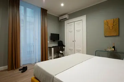 Letto o letti in una camera di Dante Maison de Prestige
