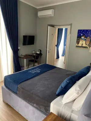 Letto o letti in una camera di Dante Maison de Prestige