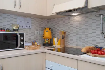 Cucina o angolo cottura di La Preziosa Apartment