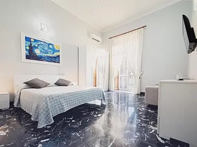 Letto o letti in una camera di Casa Fiorito