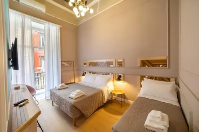 Letto o letti in una camera di The Duomo House by House In Naples
