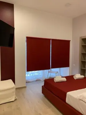Letto o letti in una camera di Maison Arena Al Corso