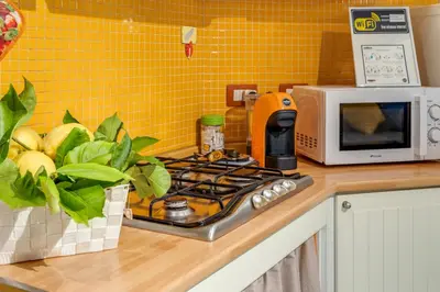 Cucina o angolo cottura di GuestHost - Casa Querida Central & Elegant Flat