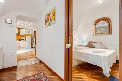 Letto o letti in una camera di GuestHost - Casa Querida Central & Elegant Flat