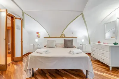 Letto o letti in una camera di GuestHost - Casa Querida Central & Elegant Flat