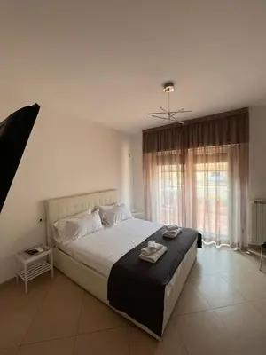 Letto o letti in una camera di Venere Penthouse Babylon