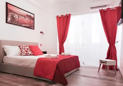 Letto o letti in una camera di Calenda Suite