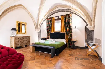 Letto o letti in una camera di Piazza San Domenico Suite By DomusExtra