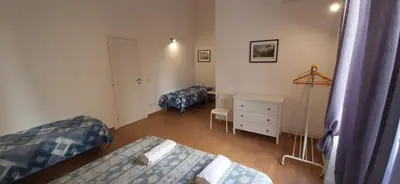 Letto o letti in una camera di Casa Laura Oliva Mancini