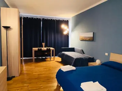 Letto o letti in una camera di About Toledo