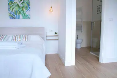 Letto o letti in una camera di Casa Fabiana