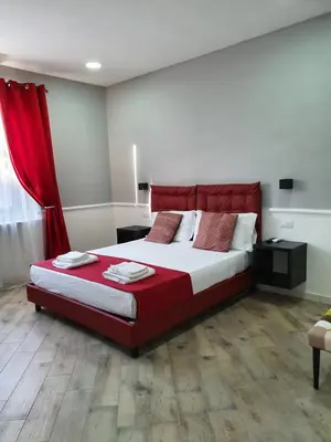 Letto o letti in una camera di Dimorra Boutique Rooms