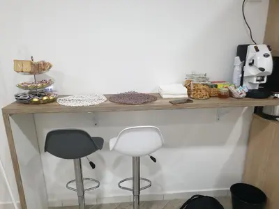 Set per la preparazione di tè e caffè presso Dimorra Boutique Rooms
