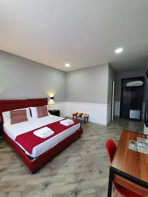Letto o letti in una camera di Dimorra Boutique Rooms
