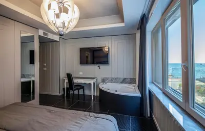 Letto o letti in una camera di Partenope Relais