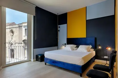 Letto o letti in una camera di Casa Pacifico Napoli