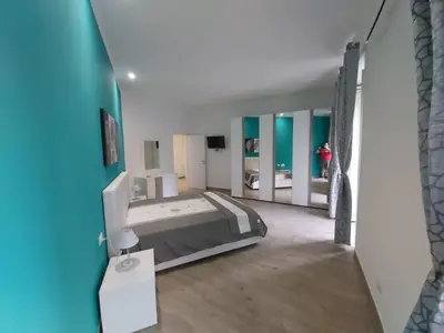 Letto o letti in una camera di Dormire a Napoli Centro Holiday House Casa Vacanza