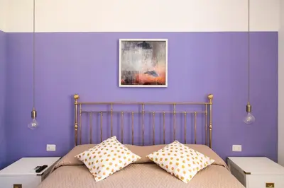 Letto o letti in una camera di A Casa di Nina Guest House