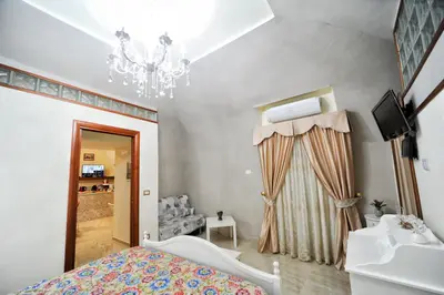 Letto o letti in una camera di B&B Punto Stella