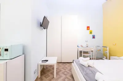Letto o letti in una camera di Room21 By DomusExtra