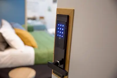 Letto o letti in una camera di Miracolo al Duomo Smart Accomodations
