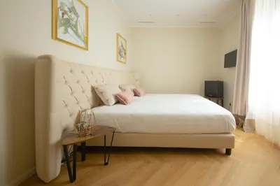 Letto o letti in una camera di Casa Vittoria Napoli - Santa Lucia