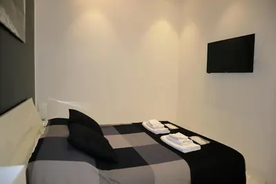 Letto o letti in una camera di Rettifilo 201 Exclusive Rooms