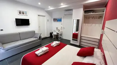 Letto o letti in una camera di Soave Rooms