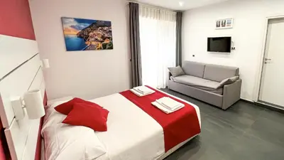 Letto o letti in una camera di Soave Rooms