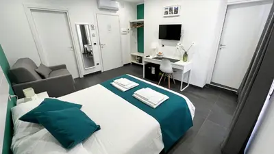 TV o dispositivi per l'intrattenimento presso Soave Rooms