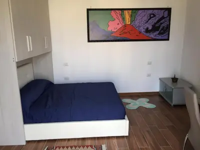 Letto o letti in una camera di Napoli bella vista