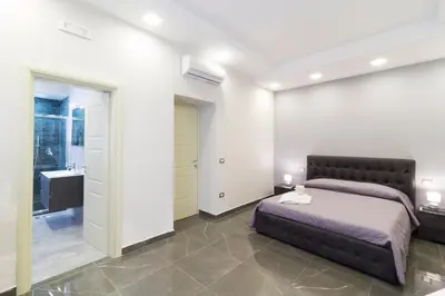 Letto o letti in una camera di Porto Rooms & Suite