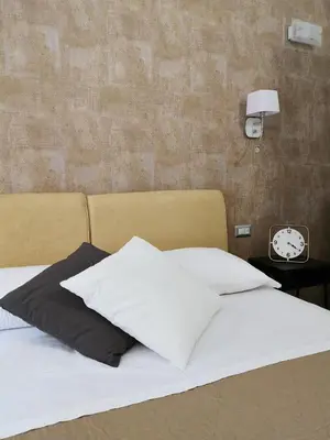 Letto o letti in una camera di La Canzanella Guest House
