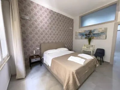 Letto o letti in una camera di La Canzanella Guest House