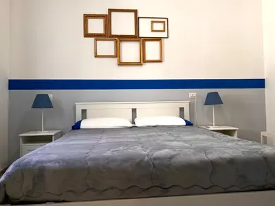 Letto o letti in una camera di Vico Longo 25 - Ensuit flat in the heart of Naples