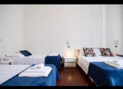 Letto o letti in una camera di B&B Residenza MALATERRA