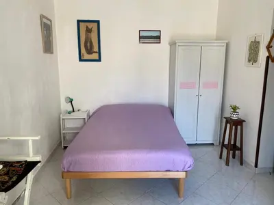 Letto o letti in una camera di Palazzo Diomede Carafa #3