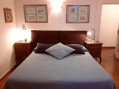 Letto o letti in una camera di B&B Amedeo