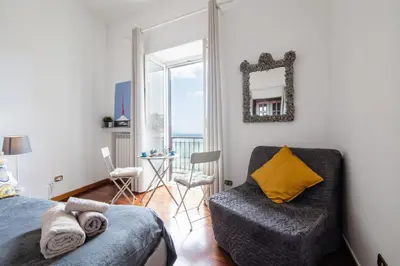 Letto o letti in una camera di NapoliCentro Mare - Sea View Rooms & Suites