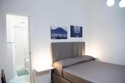 Letto o letti in una camera di Vesuvio Blu